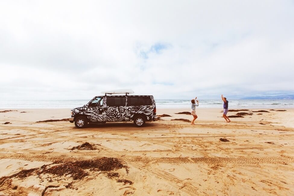 Dancing on the beach campervan