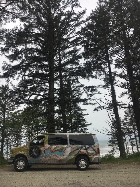 Campervan in the woods in La Push, Washington