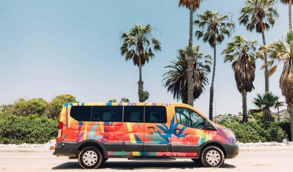 Escape Camper Vans Big Sur model exterior artwork on beach