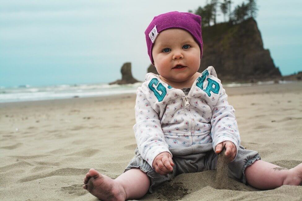 Baby on beach in Olympic National Park Washington