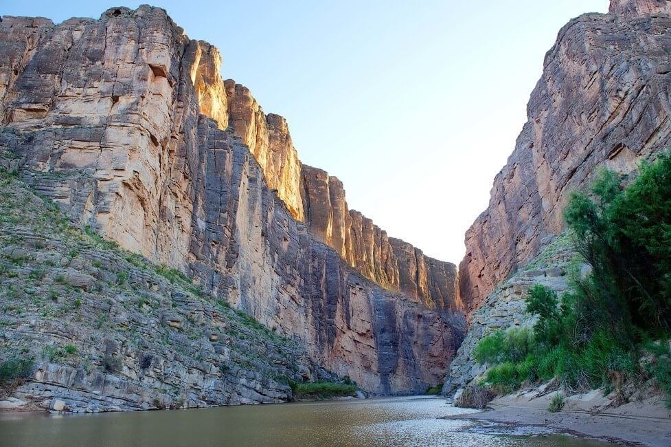 Santa Elena Canyon's sheer cliffs on the Rio Grande at sunset, Big Bend National Park, on the Texas and Mexico border, with Texas on the right-hand side and Mexico on the left-hand side, US