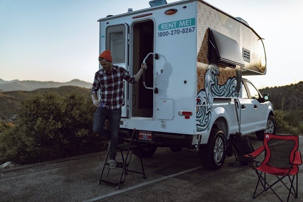 Man walking outside Newport Camper.