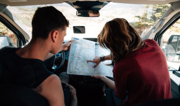 reading a map in a campervan