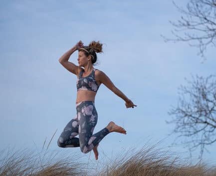 Woman jumping in the air