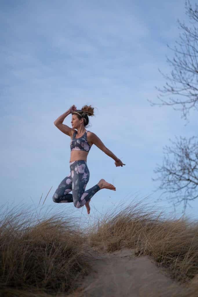 Woman jumping in the air