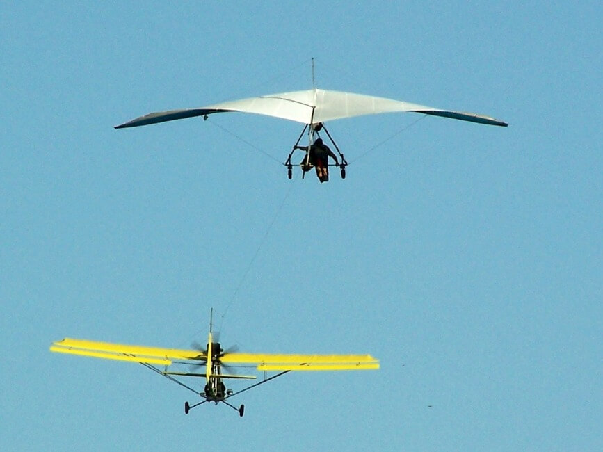 Two people gliding around on a aerotow