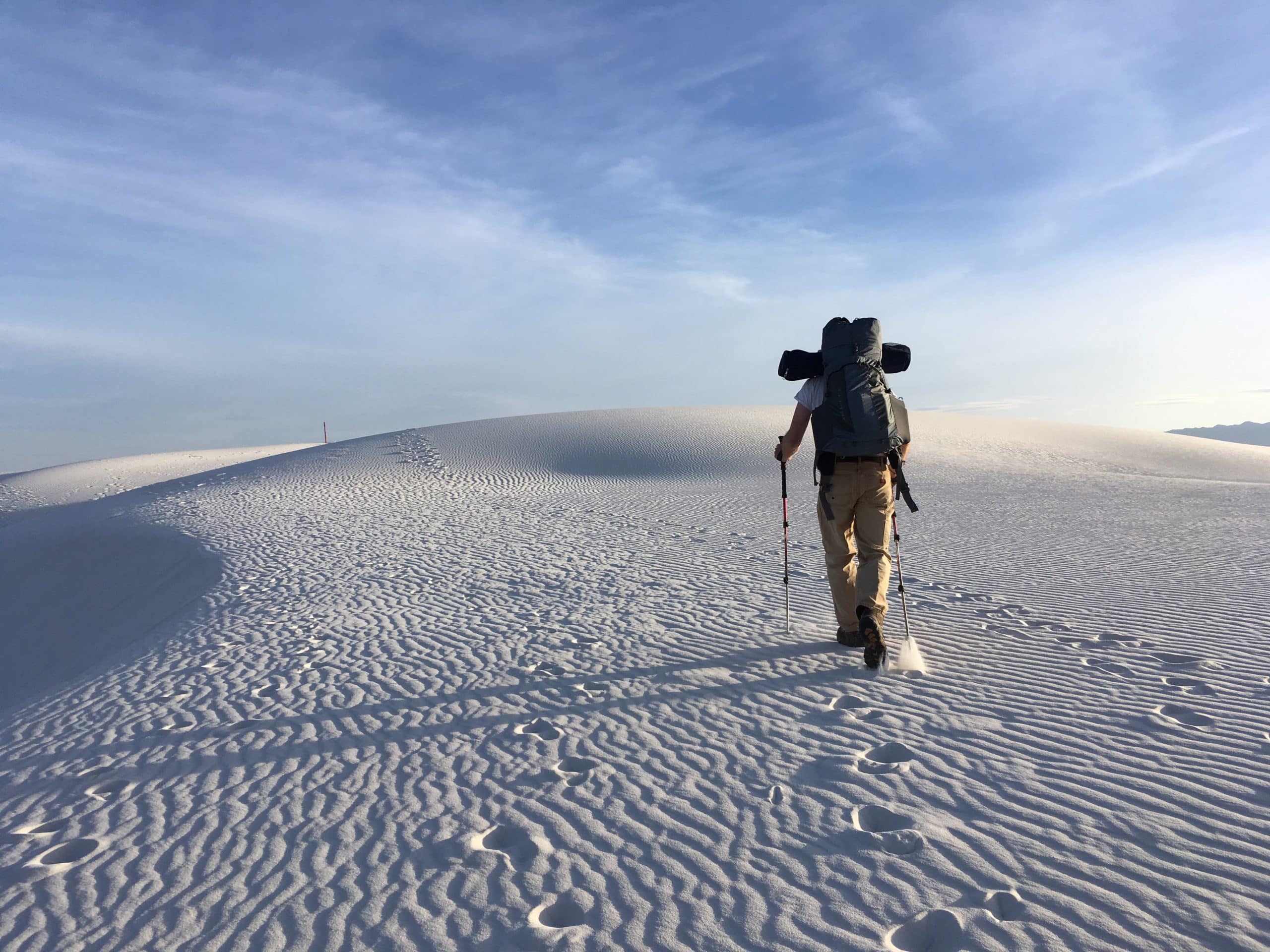 Hiker on White Sands Dunes