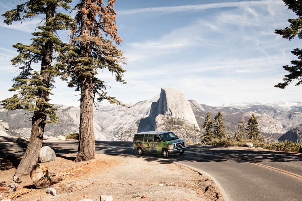 campervan driving with view of half dome