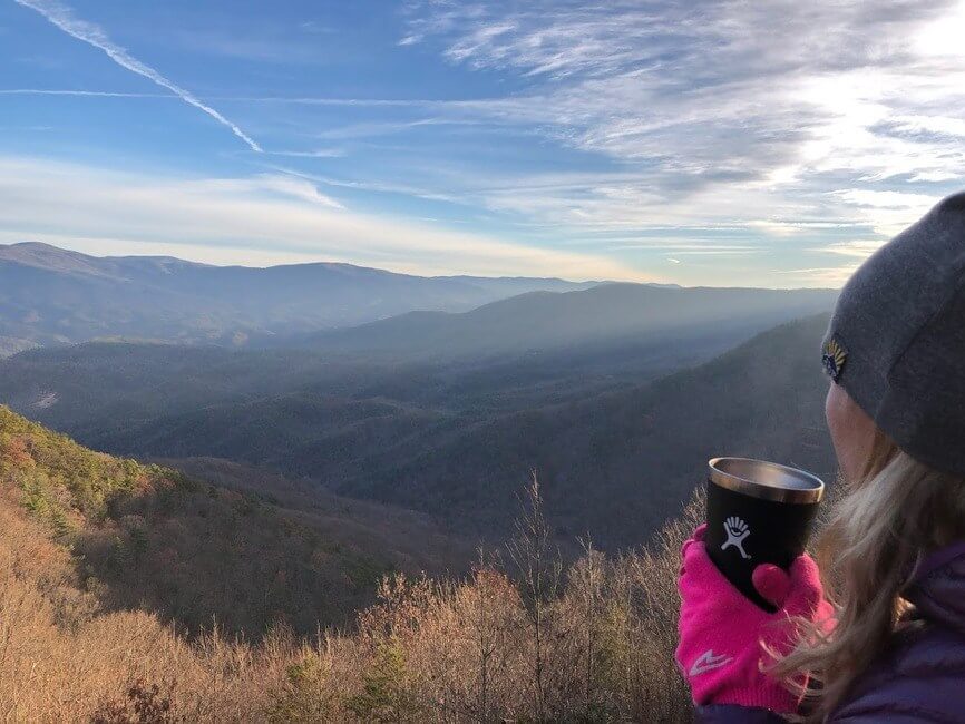 Woman overlooking mountains