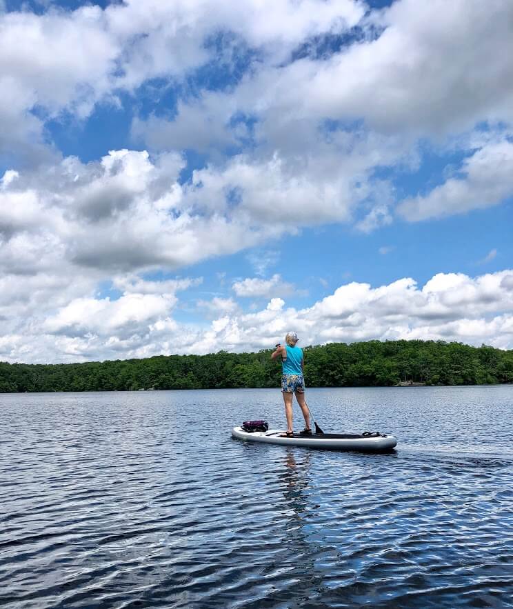 Woman paddle boarding