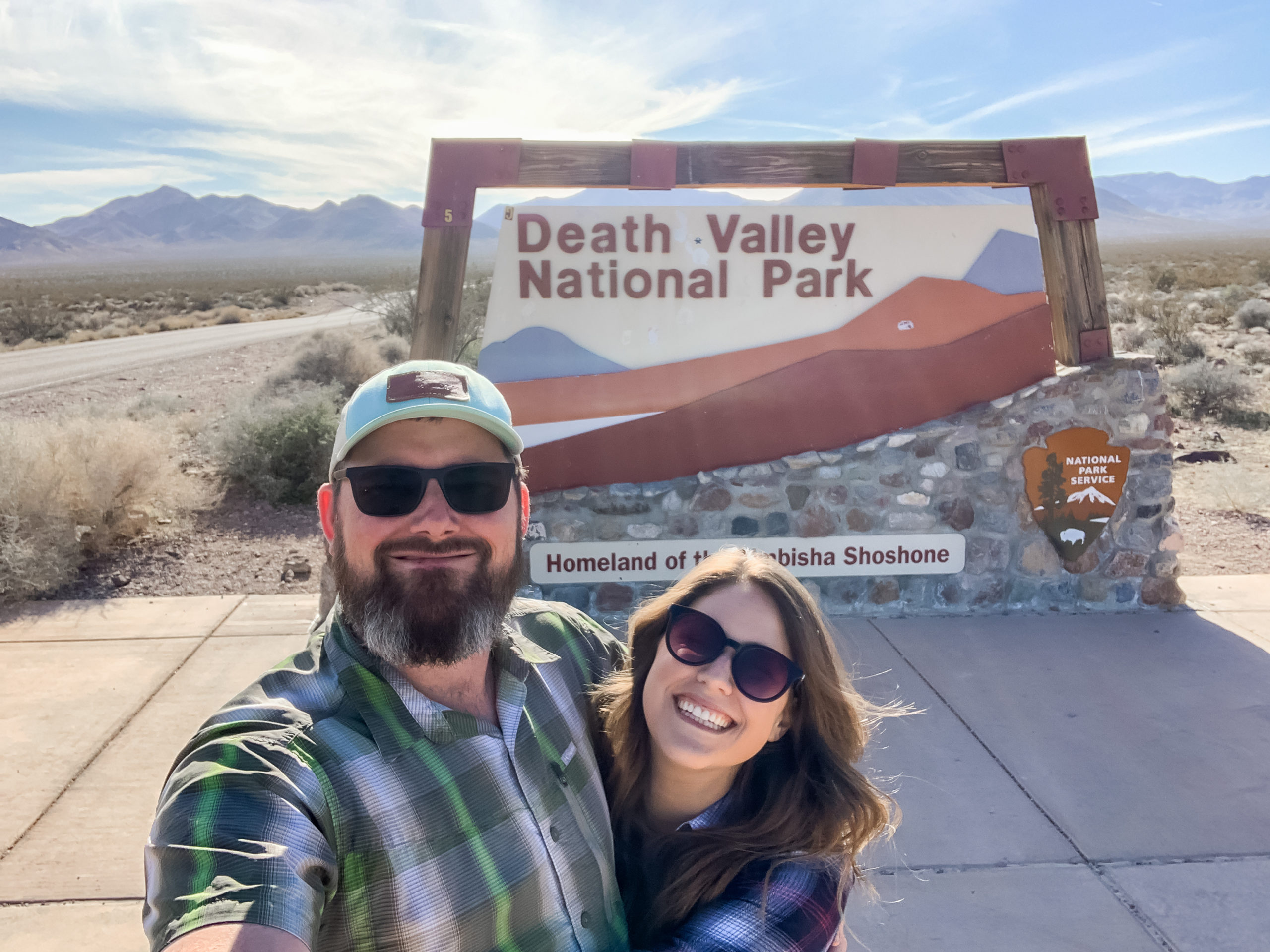 Couple standing at Death Valley entrance