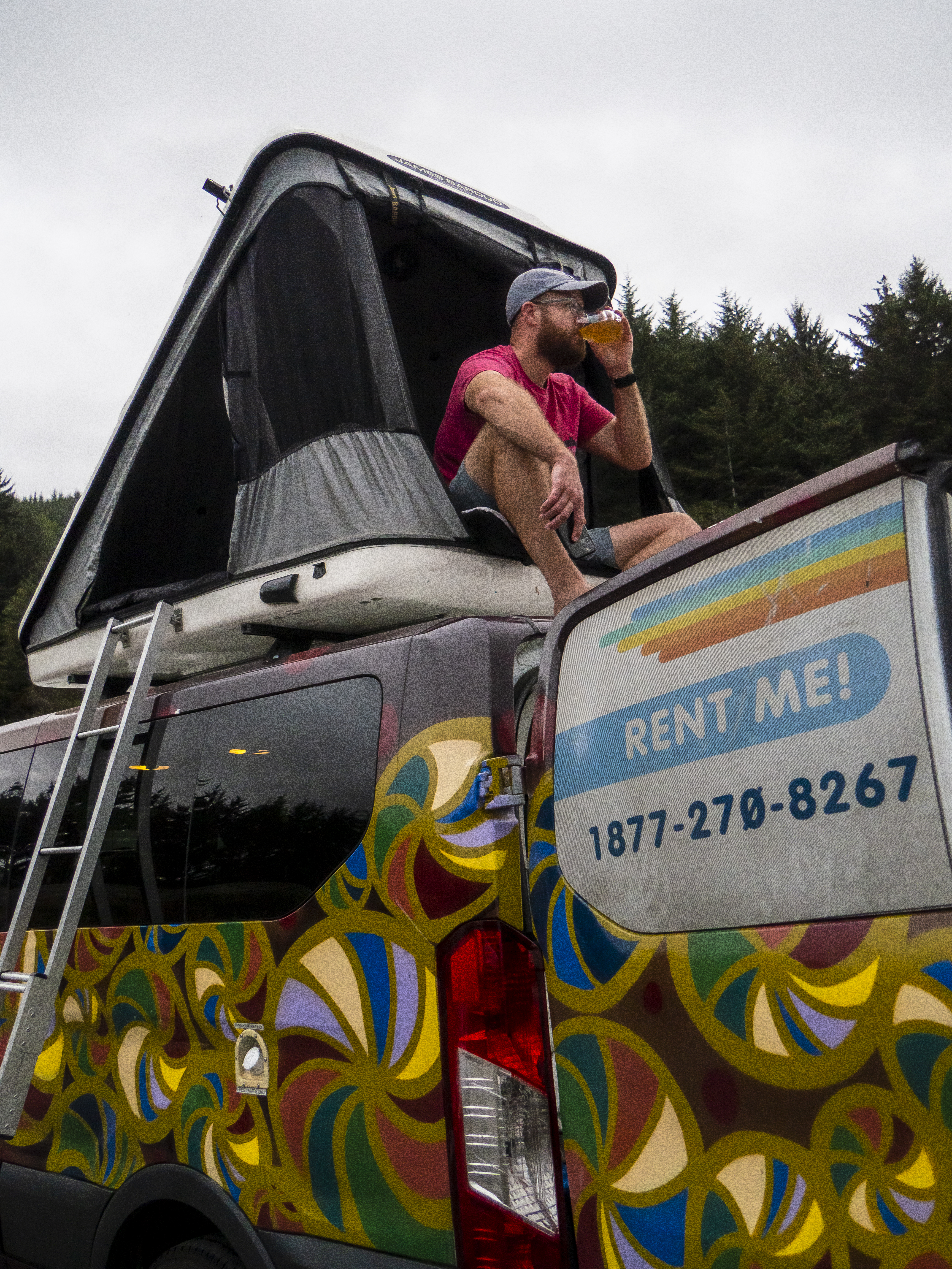 Man siting on top of an Escape Campervan