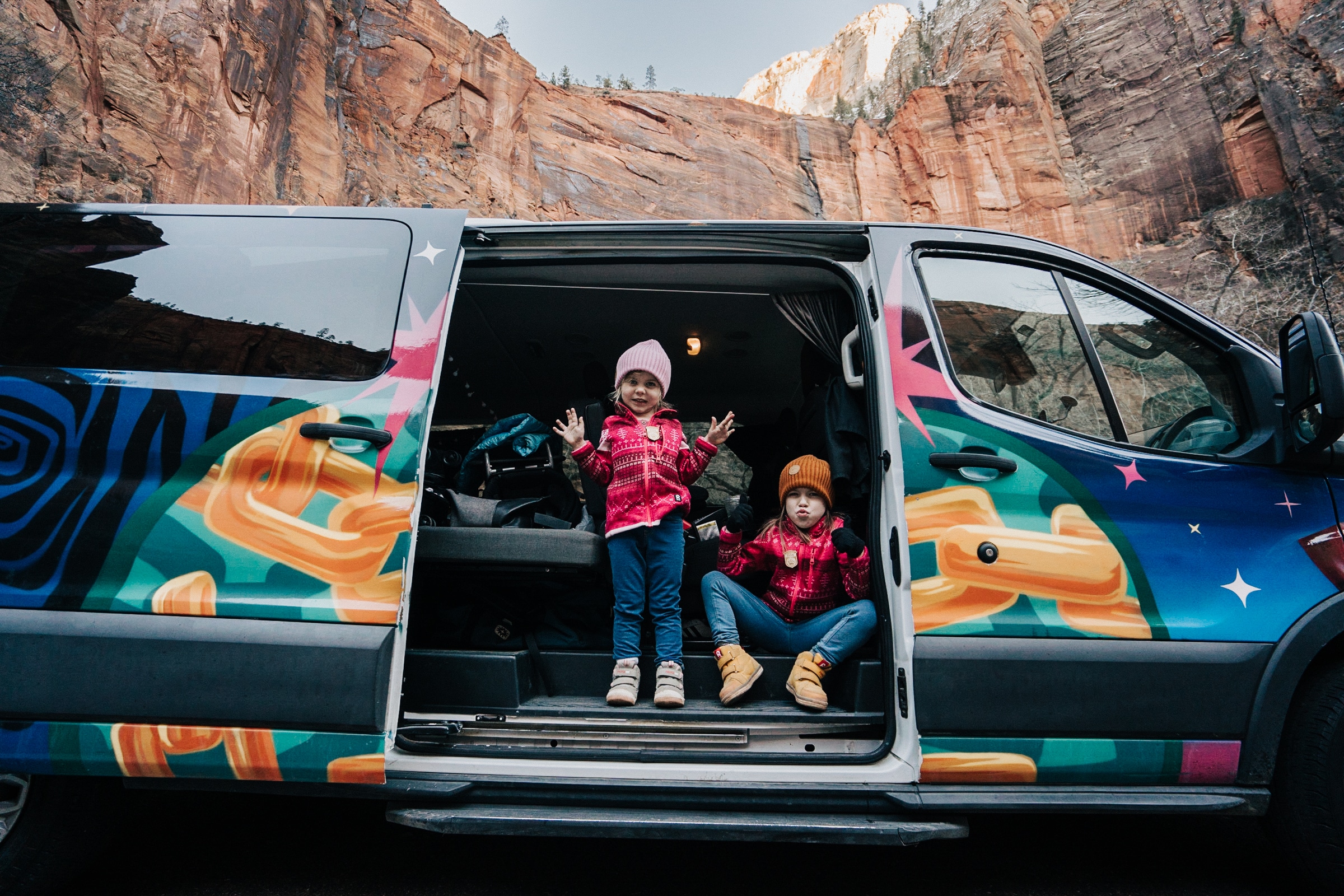 Kids in a campervan on a road trip